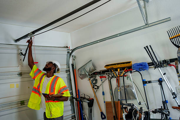 Professional Garage Door Panel Replacement technician working in Florala, AL